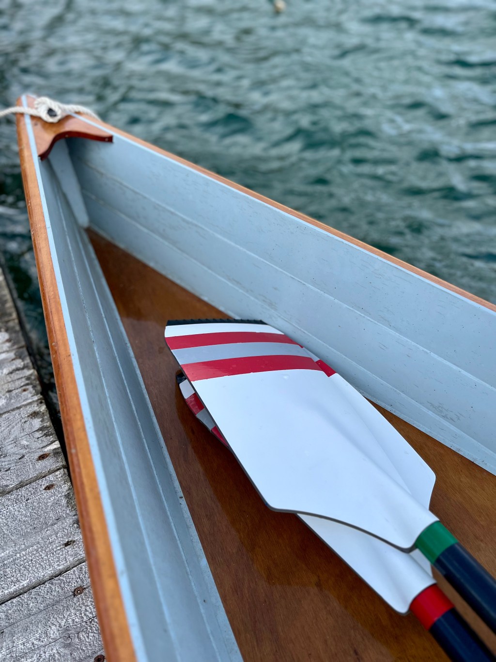 a pair of oar blades resting in the bow of an Annapolis wherry row boat